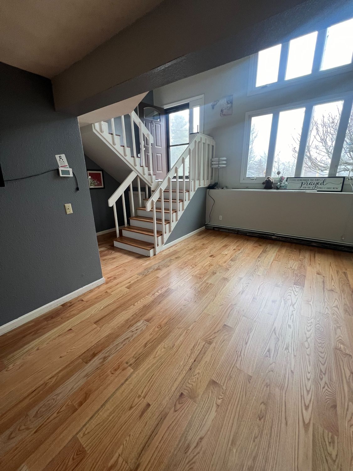 Restored Hardwood Floors and Staircase