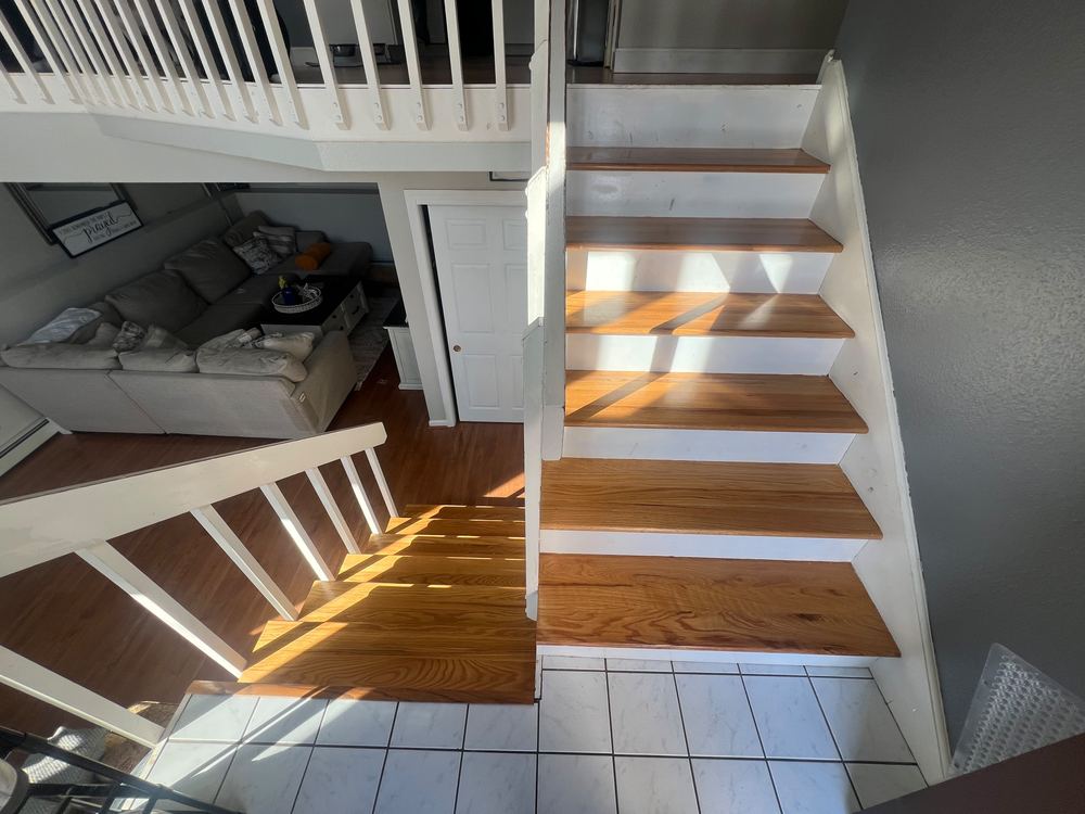 Restored Hardwood Floors and Staircase