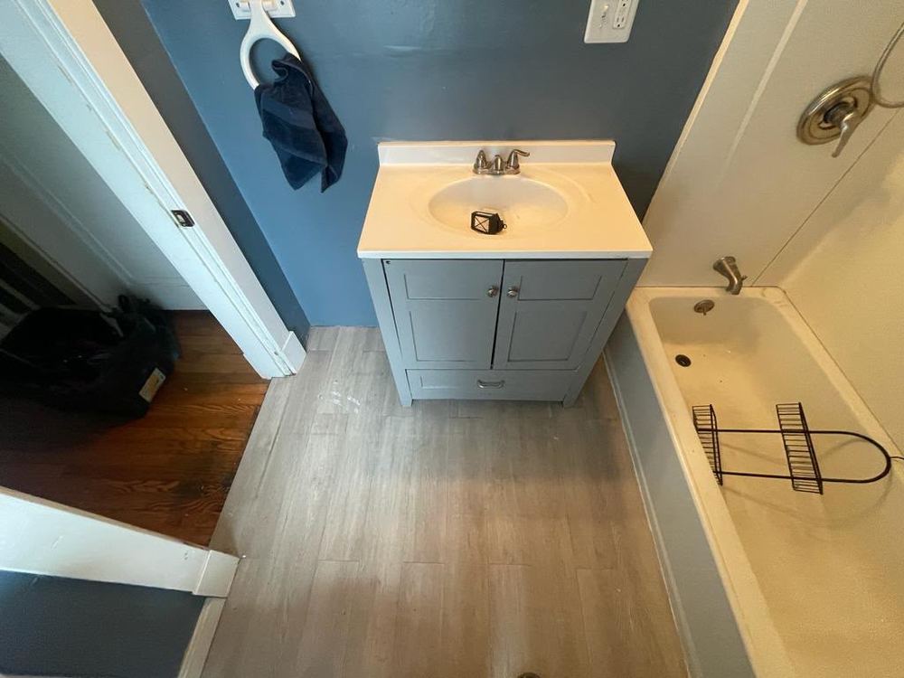 Marble Baths with Pebble Shower Floors