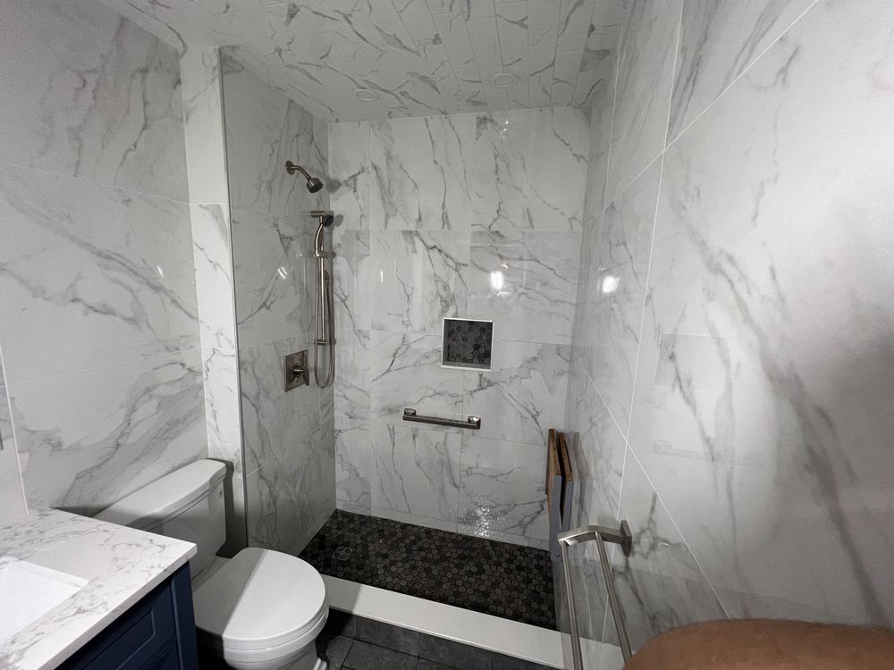 Marble Bath with Navy Vanity