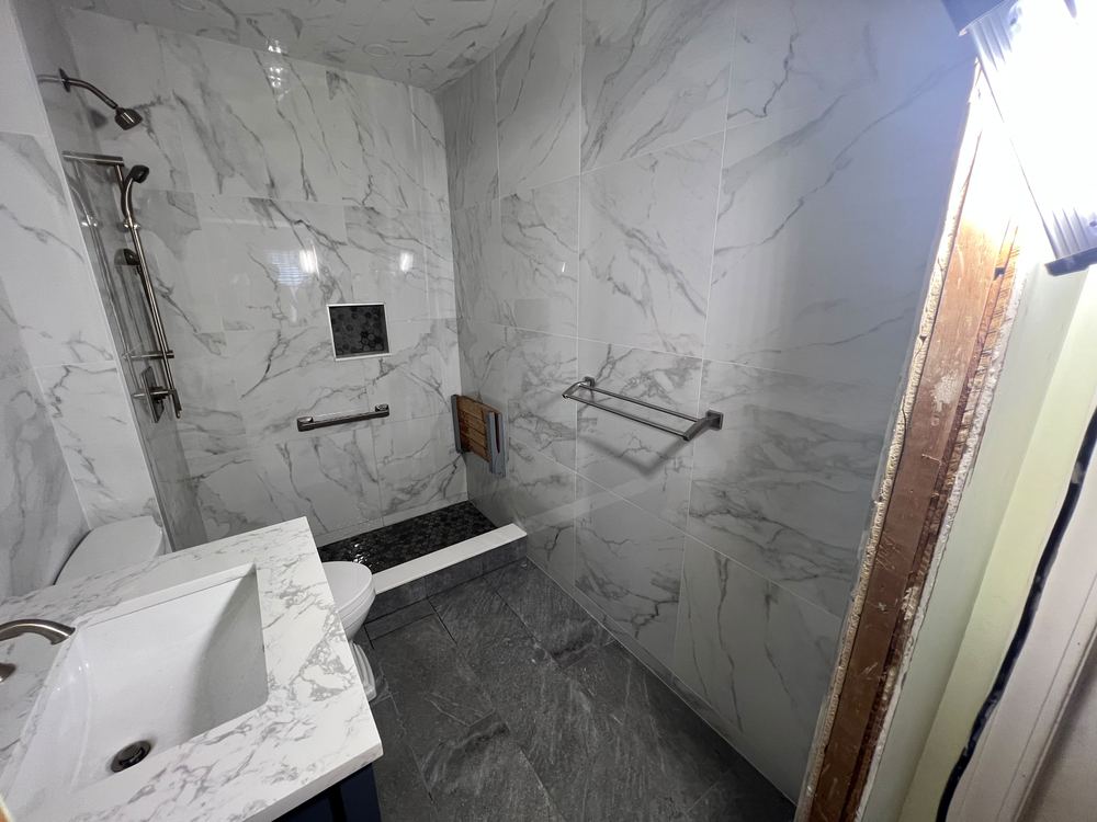 Marble Bath with Navy Vanity
