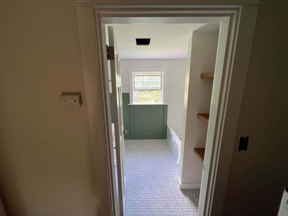 Green Boiserie Bath with Hex Floor